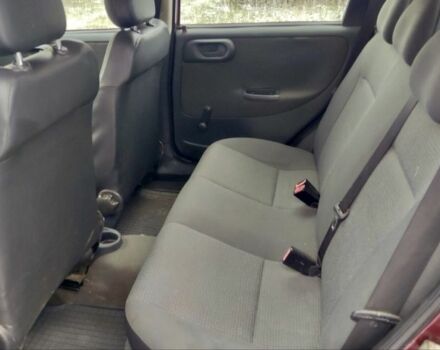 Красный Опель Корса, объемом двигателя 1 л и пробегом 216 тыс. км за 3300 $, фото 8 на Automoto.ua