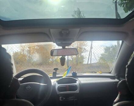 Опель Корса 2003 в Каменское - Днепродзержинск на Automoto.ua Красный Опель Корса, объемом двигателя 1 л и пробегом 153 тыс. км за 3200 $, фото 1 на Automoto.ua