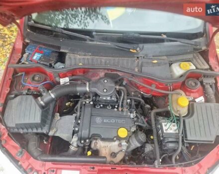 Опель Корса 2003 в Каменское - Днепродзержинск на Automoto.ua Красный Опель Корса, объемом двигателя 1 л и пробегом 153 тыс. км за 3200 $, фото 12 на Automoto.ua