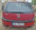 Опель Корса 2003 в Каменское - Днепродзержинск на Automoto.ua Красный Опель Корса, объемом двигателя 1 л и пробегом 153 тыс. км за 3200 $, фото 15 на Automoto.ua