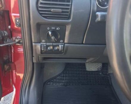 Красный Опель Корса, объемом двигателя 1.2 л и пробегом 194 тыс. км за 3200 $, фото 6 на Automoto.ua