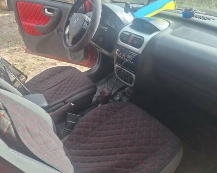 Опель Корса 2003 в Каменское - Днепродзержинск на Automoto.ua Красный Опель Корса, объемом двигателя 1 л и пробегом 153 тыс. км за 3200 $, фото 4 на Automoto.ua