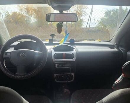 Опель Корса 2003 в Каменское - Днепродзержинск на Automoto.ua Красный Опель Корса, объемом двигателя 1 л и пробегом 153 тыс. км за 3200 $, фото 6 на Automoto.ua