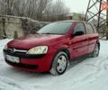 Красный Опель Корса, объемом двигателя 0.97 л и пробегом 155 тыс. км за 3600 $, фото 1 на Automoto.ua