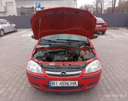 Червоний Опель Корса, об'ємом двигуна 1 л та пробігом 270 тис. км за 2936 $, фото 3 на Automoto.ua