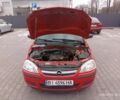 Червоний Опель Корса, об'ємом двигуна 1 л та пробігом 270 тис. км за 2936 $, фото 3 на Automoto.ua