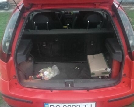 Красный Опель Корса, объемом двигателя 1 л и пробегом 279 тыс. км за 2500 $, фото 4 на Automoto.ua