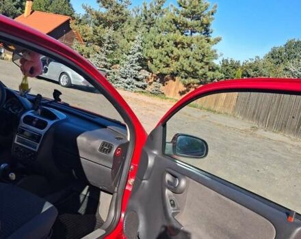 Красный Опель Корса, объемом двигателя 1.2 л и пробегом 194 тыс. км за 3200 $, фото 5 на Automoto.ua