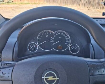 Красный Опель Корса, объемом двигателя 1.2 л и пробегом 194 тыс. км за 3200 $, фото 8 на Automoto.ua