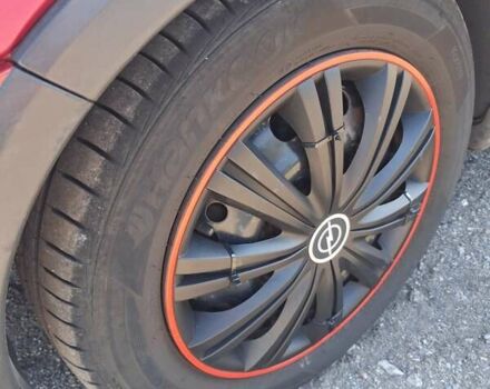 Красный Опель Корса, объемом двигателя 1.2 л и пробегом 194 тыс. км за 3200 $, фото 10 на Automoto.ua