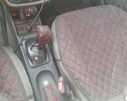 Опель Корса 2003 в Каменское - Днепродзержинск на Automoto.ua Красный Опель Корса, объемом двигателя 1 л и пробегом 153 тыс. км за 3200 $, фото 9 на Automoto.ua