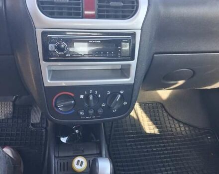 Красный Опель Корса, объемом двигателя 1.2 л и пробегом 194 тыс. км за 3200 $, фото 4 на Automoto.ua