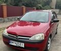 Красный Опель Корса, объемом двигателя 0.97 л и пробегом 190 тыс. км за 2950 $, фото 1 на Automoto.ua