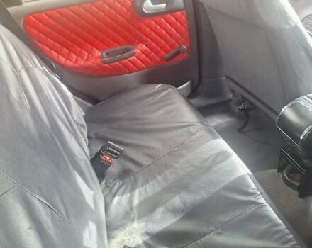 Опель Корса 2003 в Каменское - Днепродзержинск на Automoto.ua Красный Опель Корса, объемом двигателя 1 л и пробегом 153 тыс. км за 3200 $, фото 2 на Automoto.ua