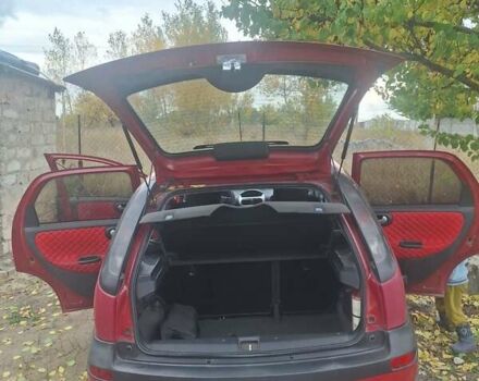 Опель Корса 2003 в Каменское - Днепродзержинск на Automoto.ua Красный Опель Корса, объемом двигателя 1 л и пробегом 153 тыс. км за 3200 $, фото 11 на Automoto.ua