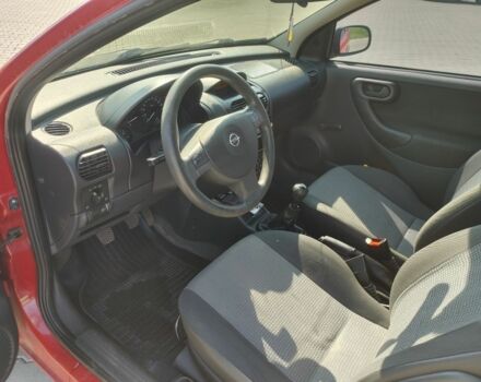 Красный Опель Корса, объемом двигателя 1 л и пробегом 194 тыс. км за 1900 $, фото 19 на Automoto.ua