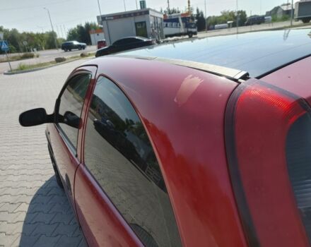 Красный Опель Корса, объемом двигателя 1 л и пробегом 194 тыс. км за 1900 $, фото 15 на Automoto.ua