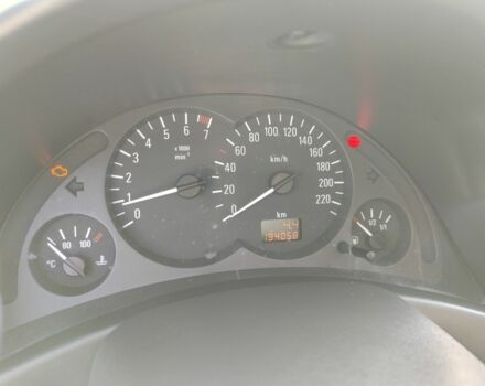 Красный Опель Корса, объемом двигателя 1 л и пробегом 194 тыс. км за 1900 $, фото 21 на Automoto.ua