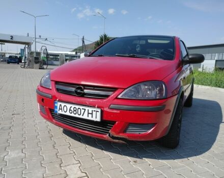 Красный Опель Корса, объемом двигателя 1 л и пробегом 194 тыс. км за 1900 $, фото 6 на Automoto.ua