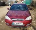 Червоний Опель Корса, об'ємом двигуна 1.2 л та пробігом 165 тис. км за 3100 $, фото 1 на Automoto.ua