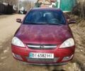 Червоний Опель Корса, об'ємом двигуна 1.2 л та пробігом 165 тис. км за 2900 $, фото 1 на Automoto.ua