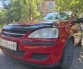 Красный Опель Корса, объемом двигателя 1.2 л и пробегом 201 тыс. км за 2700 $, фото 1 на Automoto.ua