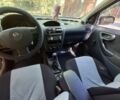 Красный Опель Корса, объемом двигателя 1.2 л и пробегом 201 тыс. км за 2700 $, фото 3 на Automoto.ua