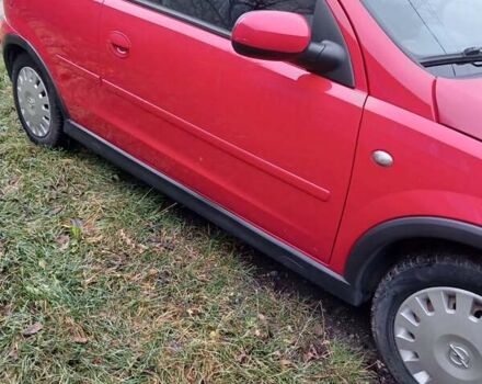 Красный Опель Корса, объемом двигателя 1 л и пробегом 342 тыс. км за 3000 $, фото 7 на Automoto.ua