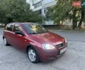 Красный Опель Корса, объемом двигателя 1.2 л и пробегом 202 тыс. км за 2555 $, фото 1 на Automoto.ua