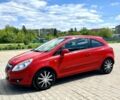 Красный Опель Корса, объемом двигателя 1.2 л и пробегом 220 тыс. км за 3999 $, фото 1 на Automoto.ua