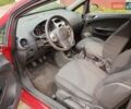 Красный Опель Корса, объемом двигателя 1.23 л и пробегом 270 тыс. км за 3300 $, фото 8 на Automoto.ua
