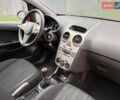 Красный Опель Корса, объемом двигателя 1.23 л и пробегом 270 тыс. км за 3300 $, фото 6 на Automoto.ua