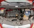 Красный Опель Корса, объемом двигателя 1.23 л и пробегом 270 тыс. км за 3300 $, фото 14 на Automoto.ua