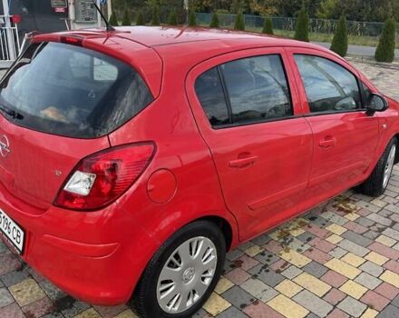 Червоний Опель Корса, об'ємом двигуна 1.23 л та пробігом 100 тис. км за 5000 $, фото 1 на Automoto.ua