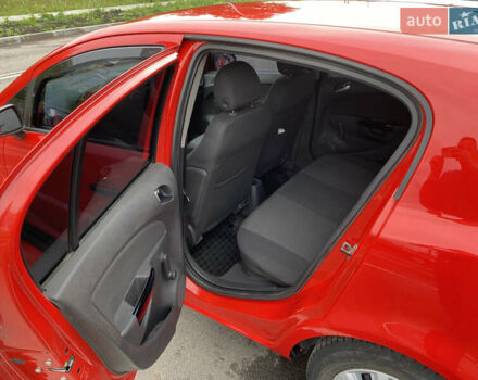 Красный Опель Корса, объемом двигателя 1 л и пробегом 220 тыс. км за 4000 $, фото 23 на Automoto.ua