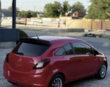 Красный Опель Корса, объемом двигателя 1.2 л и пробегом 147 тыс. км за 4950 $, фото 2 на Automoto.ua