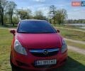 Красный Опель Корса, объемом двигателя 1.23 л и пробегом 205 тыс. км за 3600 $, фото 1 на Automoto.ua