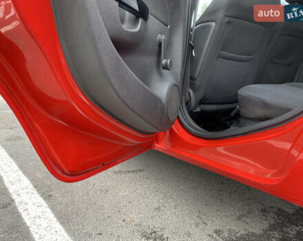 Красный Опель Корса, объемом двигателя 1 л и пробегом 220 тыс. км за 4000 $, фото 15 на Automoto.ua