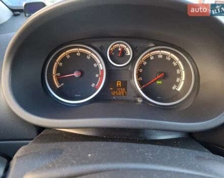 Красный Опель Корса, объемом двигателя 1.23 л и пробегом 125 тыс. км за 4900 $, фото 6 на Automoto.ua