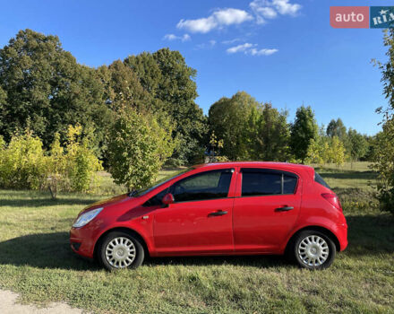 Красный Опель Корса, объемом двигателя 1.23 л и пробегом 135 тыс. км за 6000 $, фото 1 на Automoto.ua