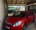 Красный Опель Корса, объемом двигателя 1.23 л и пробегом 119 тыс. км за 4850 $, фото 1 на Automoto.ua