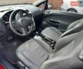 Красный Опель Корса, объемом двигателя 1.23 л и пробегом 180 тыс. км за 4500 $, фото 4 на Automoto.ua