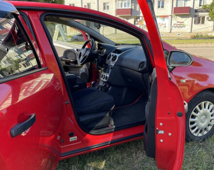 Красный Опель Корса, объемом двигателя 1.23 л и пробегом 135 тыс. км за 6000 $, фото 27 на Automoto.ua