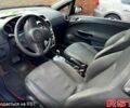 Красный Опель Корса, объемом двигателя 1.2 л и пробегом 180 тыс. км за 4500 $, фото 3 на Automoto.ua