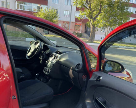 Красный Опель Корса, объемом двигателя 1.23 л и пробегом 135 тыс. км за 6000 $, фото 42 на Automoto.ua