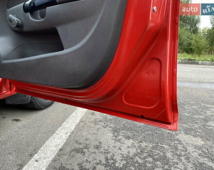 Красный Опель Корса, объемом двигателя 1 л и пробегом 220 тыс. км за 4000 $, фото 12 на Automoto.ua