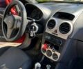 Красный Опель Корса, объемом двигателя 1.2 л и пробегом 205 тыс. км за 4200 $, фото 8 на Automoto.ua