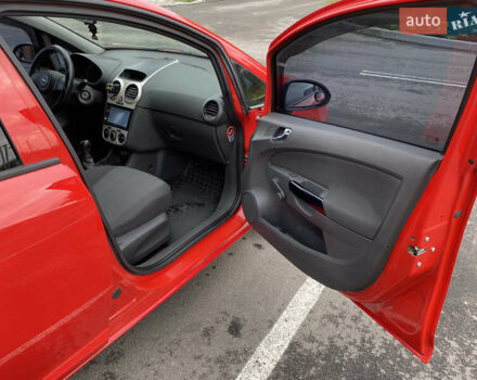 Красный Опель Корса, объемом двигателя 1 л и пробегом 220 тыс. км за 4000 $, фото 13 на Automoto.ua