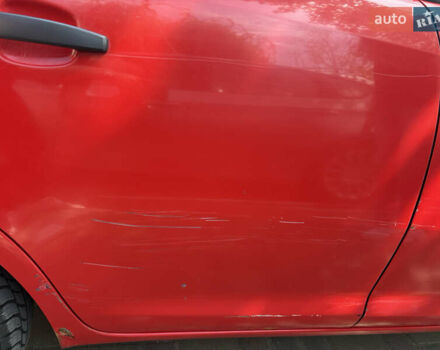 Красный Опель Корса, объемом двигателя 1.22 л и пробегом 216 тыс. км за 3800 $, фото 9 на Automoto.ua