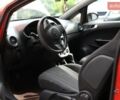 Красный Опель Корса, объемом двигателя 1 л и пробегом 213 тыс. км за 4600 $, фото 1 на Automoto.ua